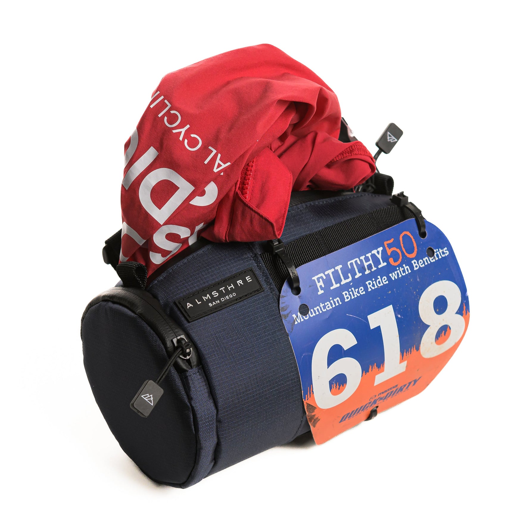 ALMSTHRE Signature Bar Bag in midnight blue with cycling gear attached