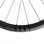 Close-up detail of Reynolds AR41 carbon rim sidewall showing model name lettering