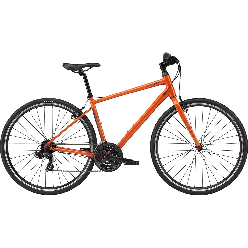 Orange Cannondale Quick 6 hybrid bicycle with black components on white background