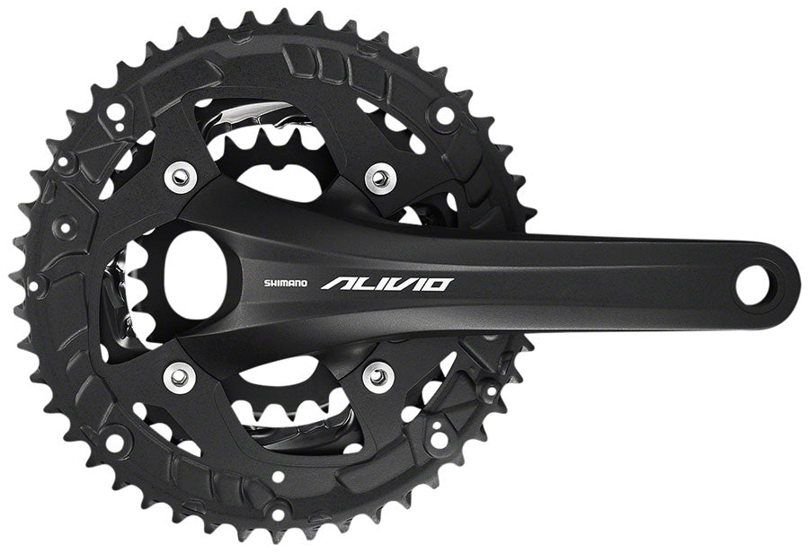 Shimano Alivio black triple chainset with three chainrings on white background