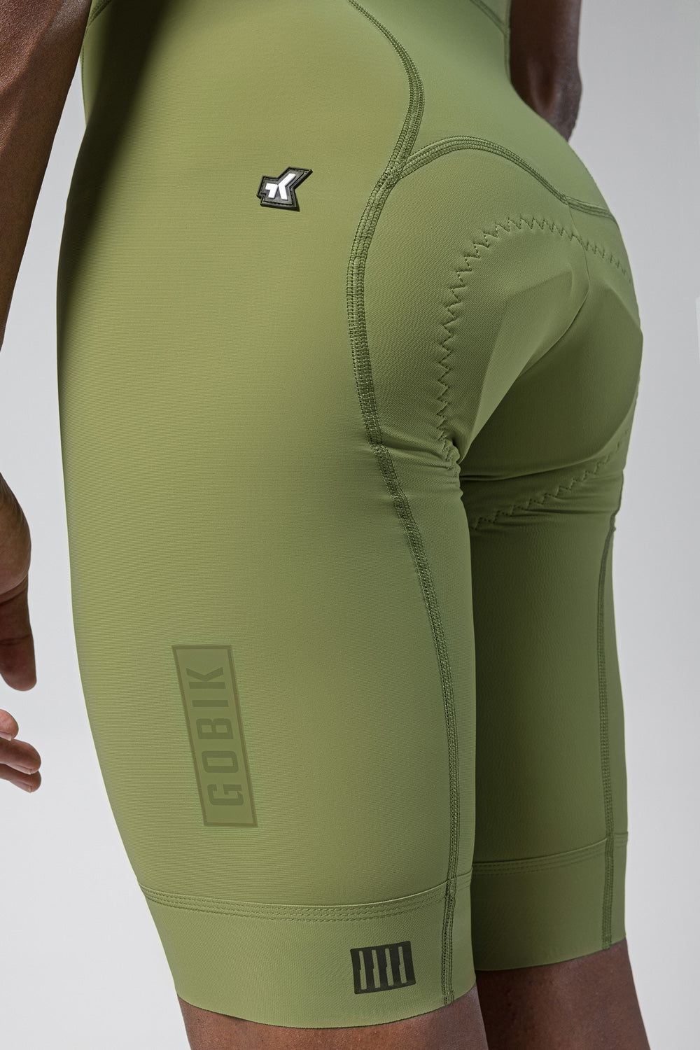 Gobik Matt 2.0 bib shorts in olive green with professional model photography