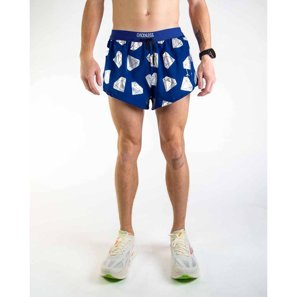 Man wearing blue ChicknLegs running shorts with white diamond pattern and drawstring waist