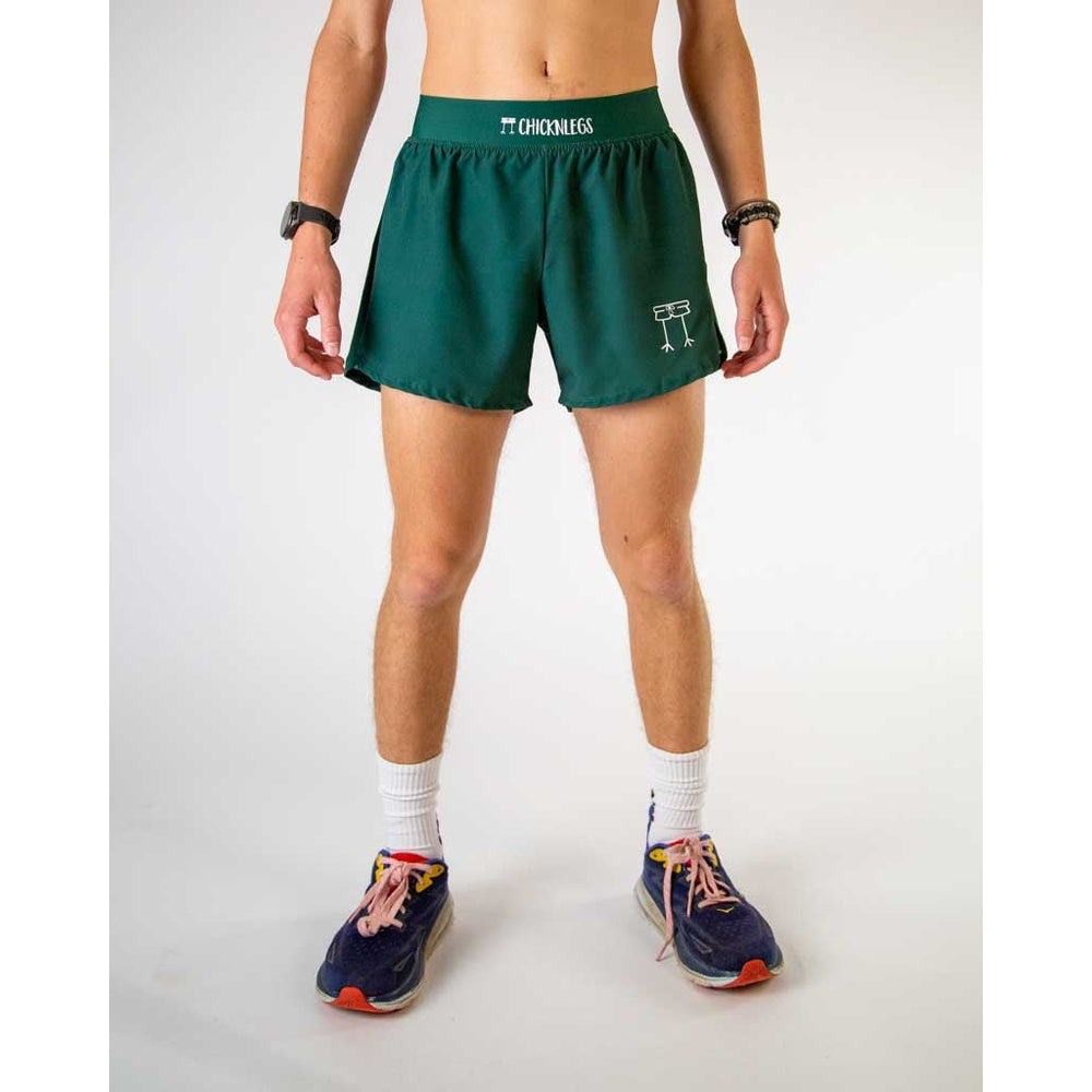 Man wearing ChicknLegs forest green athletic shorts with split design