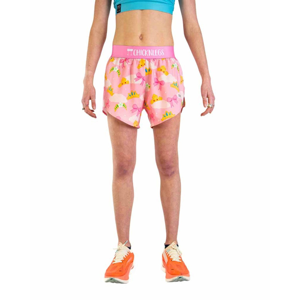 Pink ChicknLegs running shorts with princess tiara pattern and split sides