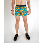 ChicknLegs men's turquoise shorts with orange dinosaur nugget pattern and red details