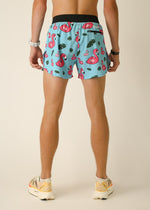 Men's light blue running shorts with pink flamingo and tropical leaf pattern