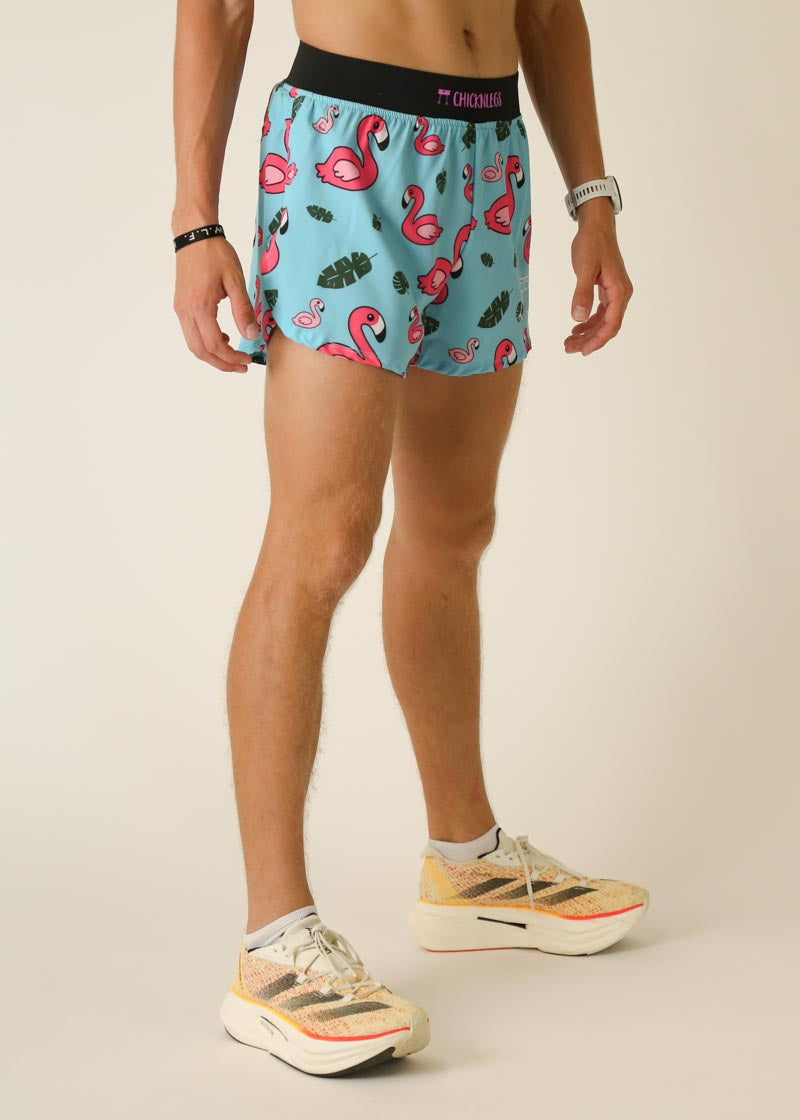 ChicknLegs men's running shorts in light blue with pink flamingo tropical print