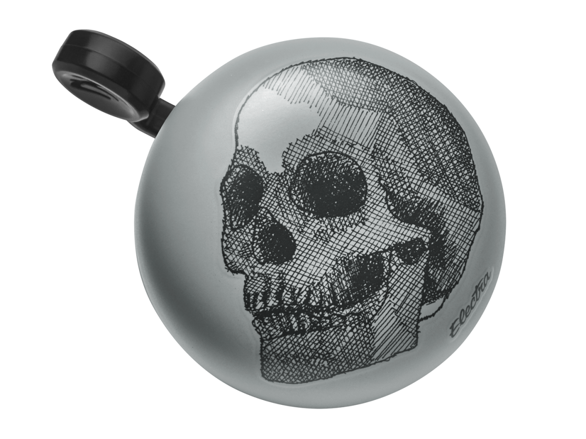 Electra bicycle bell in light gray with black skull crosshatch design