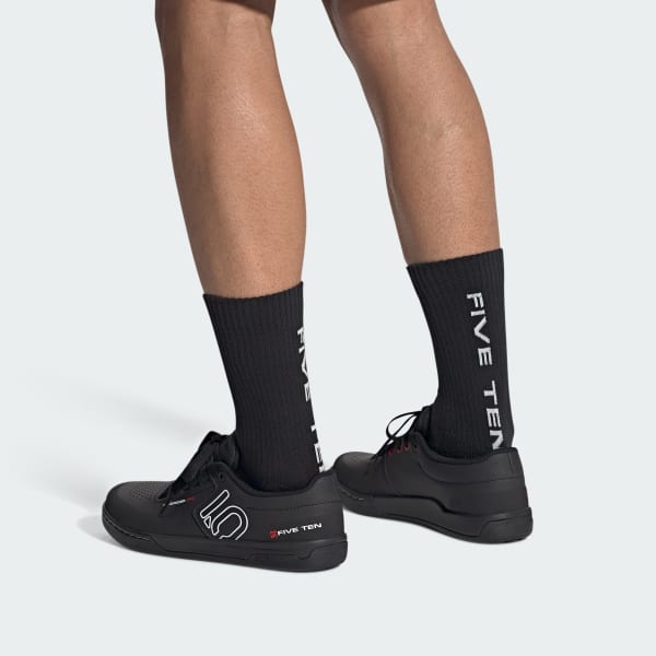 Five Ten Freerider Pro MTB shoes in black with white branding worn with black socks