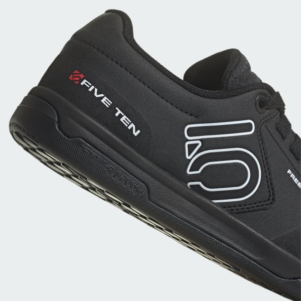 Five Ten Freerider Pro MTB shoes in black with white accents on gray background