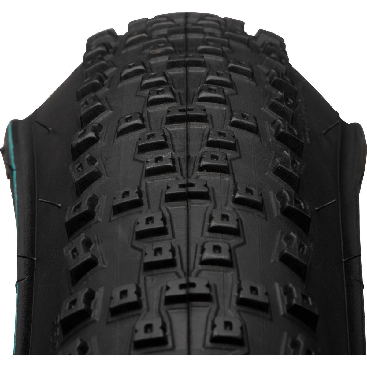 Blackburn 24x2.0 MTB black mountain bike tire showing aggressive knobby tread pattern