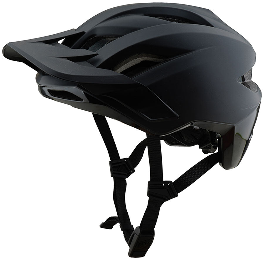 Troy Lee Designs Flowline SE stealth black helmet, rear side view with retention system visible