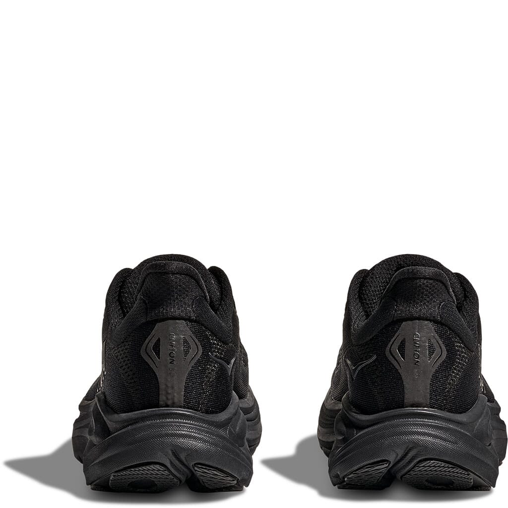 Hoka Clifton 10 Women's black shoes rear heel view showing CLIFTON branding on heel counter