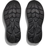 Hoka Clifton 10 Women's outsole view showing black rubber tread pattern on both shoes