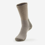 Thorlos Men's Hiking Thick Cushion Crew sock in grey taupe standing upright