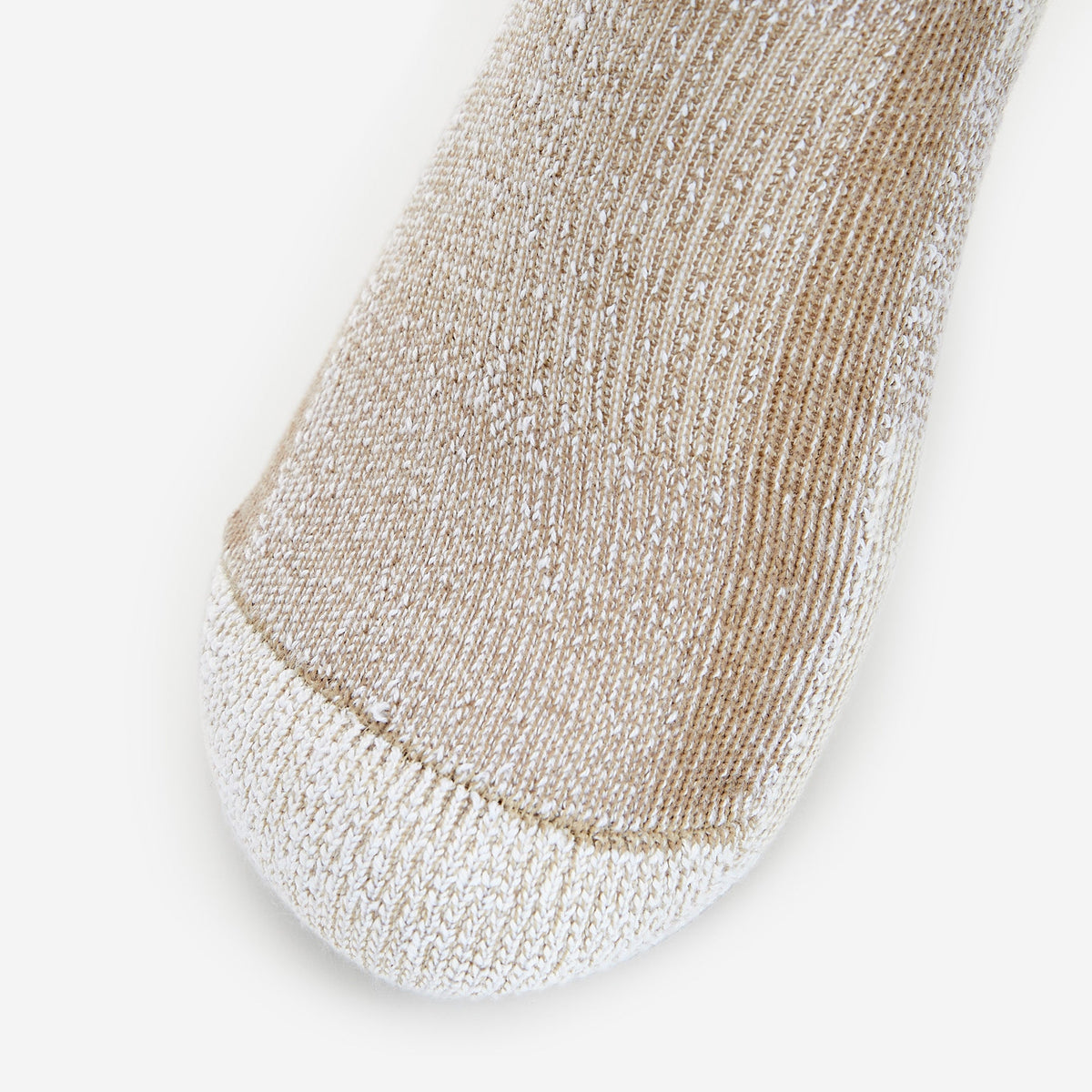 Close-up of Thorlos hiking sock toe area in khaki heather showing knit texture and seam