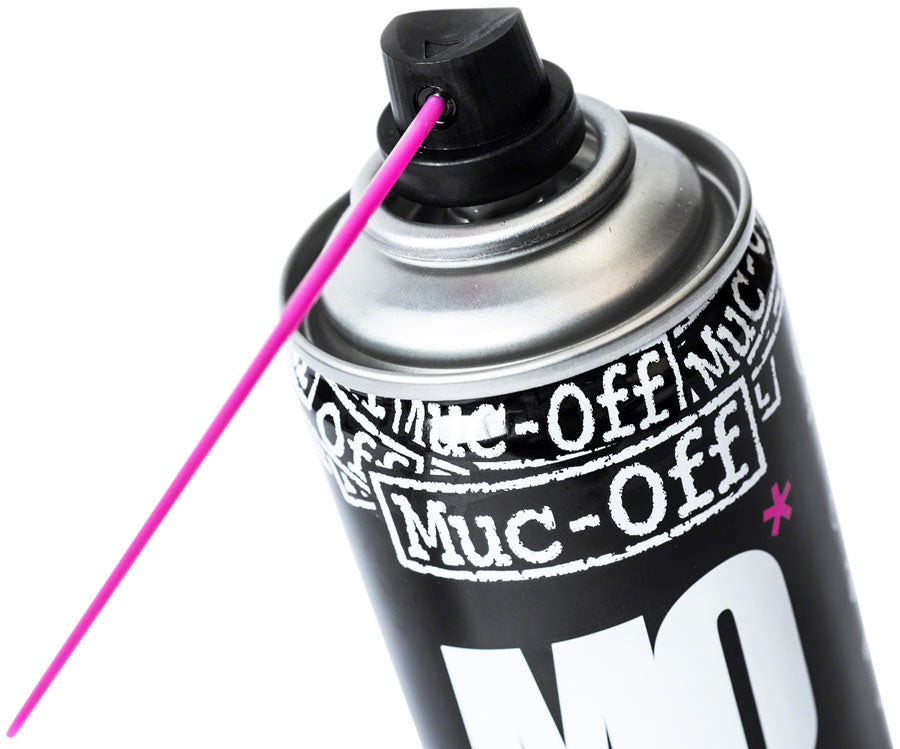 Muc-Off MO-94 aerosol can top view showing pink precision straw nozzle attachment