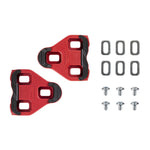 Look Delta red cleats pair with mounting hardware screws and washers on white background
