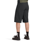 Black Dakine Vectra shorts worn by model showing rear view and fit