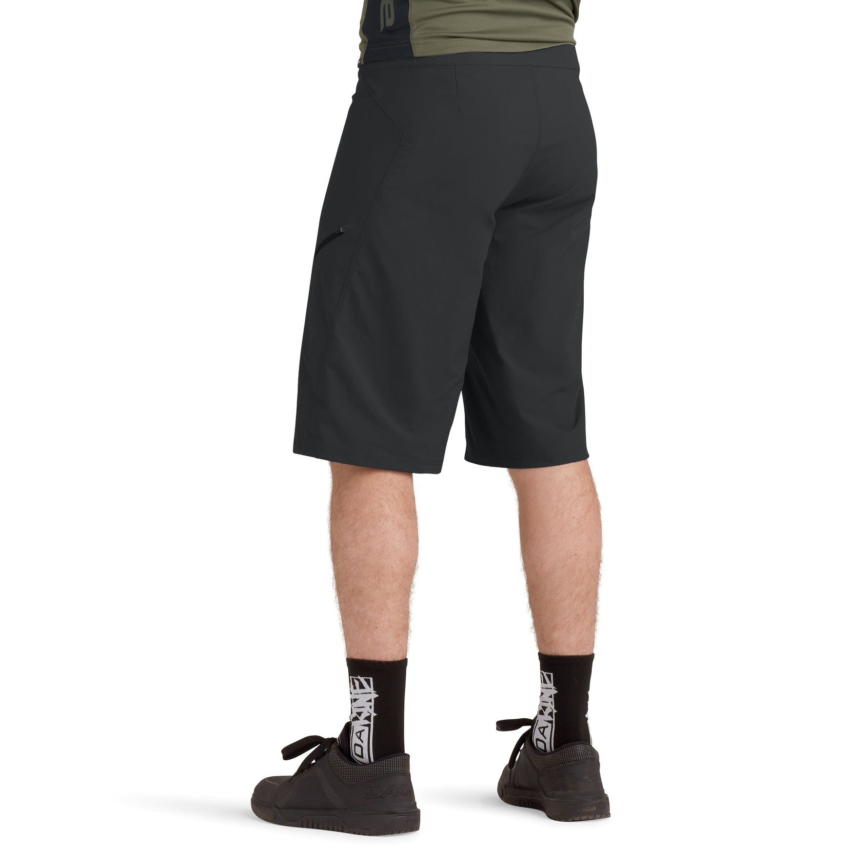 Black Dakine Vectra shorts worn by model showing rear view and fit