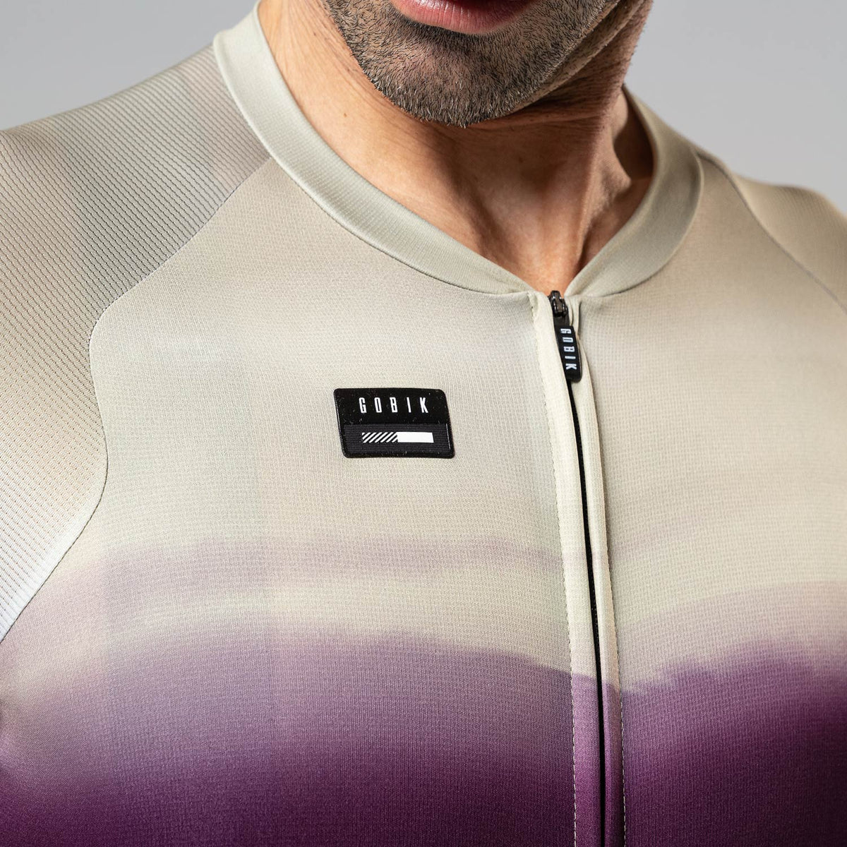 Gobik CX-Pro cycling jersey in Teaberry colorway worn by male model, close-up chest view