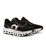 On Cloudmonster 2 running shoes in black with white CloudTec sole