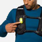 Nathan safety yellow LED strobe light clipped to black running vest chest strap