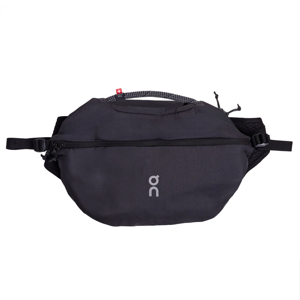 On Sling Pack 9L in Magnet Black with adjustable strap and front zipper pocket