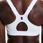 On Running Performance Bra in white showing adjustable straps and keyhole back detail close-up