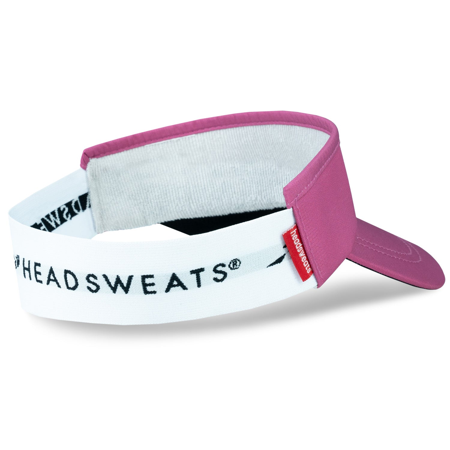 Headsweats pink and white visor with brand logo on clean background