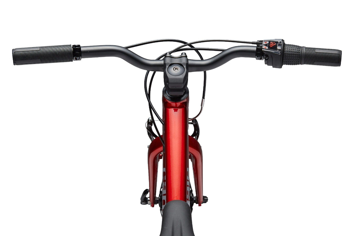 Front-facing handlebar view of Cannondale Kids Quick C2 showing stem, grips, and brake levers