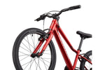 Front fork and handlebar detail of Cannondale Kids Quick C2 in metallic red with Kenda tire