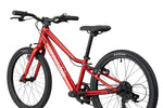 Close-up of Cannondale Kids Quick C2 metallic red frame with handlebars and saddle detail