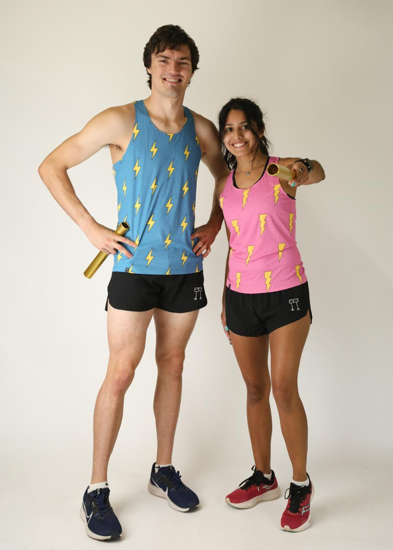 Man and woman wearing blue and pink lightning bolt athletic tank tops