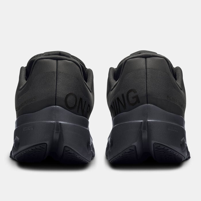On Cloudsurfer Next men's running shoes rear view showing heel counter and On Running branding in black