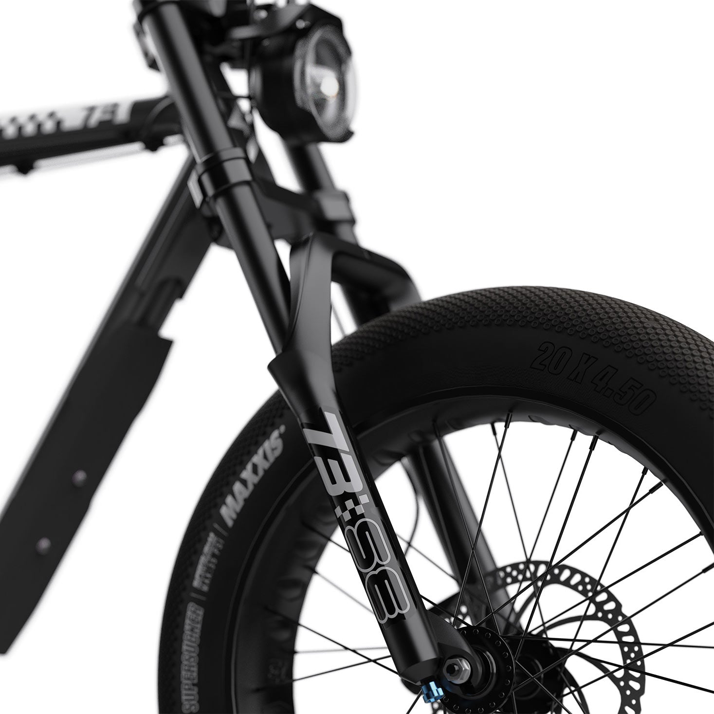 Close-up of SUPER73 electric bike front wheel, fork, and headlight in black