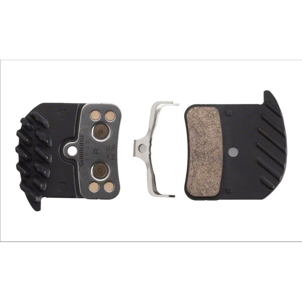 Shimano H03C metal disc brake pads with cooling fins, spring, and split pin