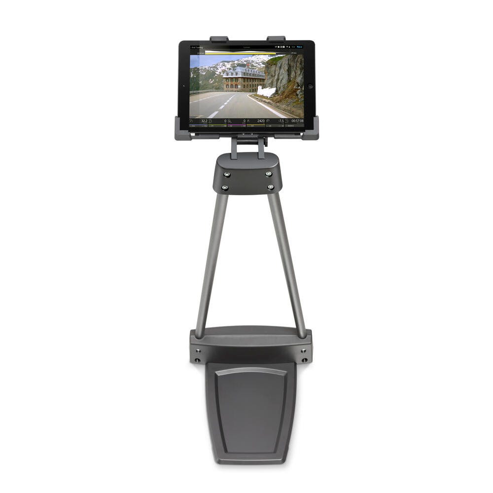 Wahoo KICKR CLIMB base adapter floor stand with tablet holder displaying cycling app on screen