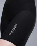 TheOneOff Xenon Bib Short in black with subtle grey brand logo on thigh
