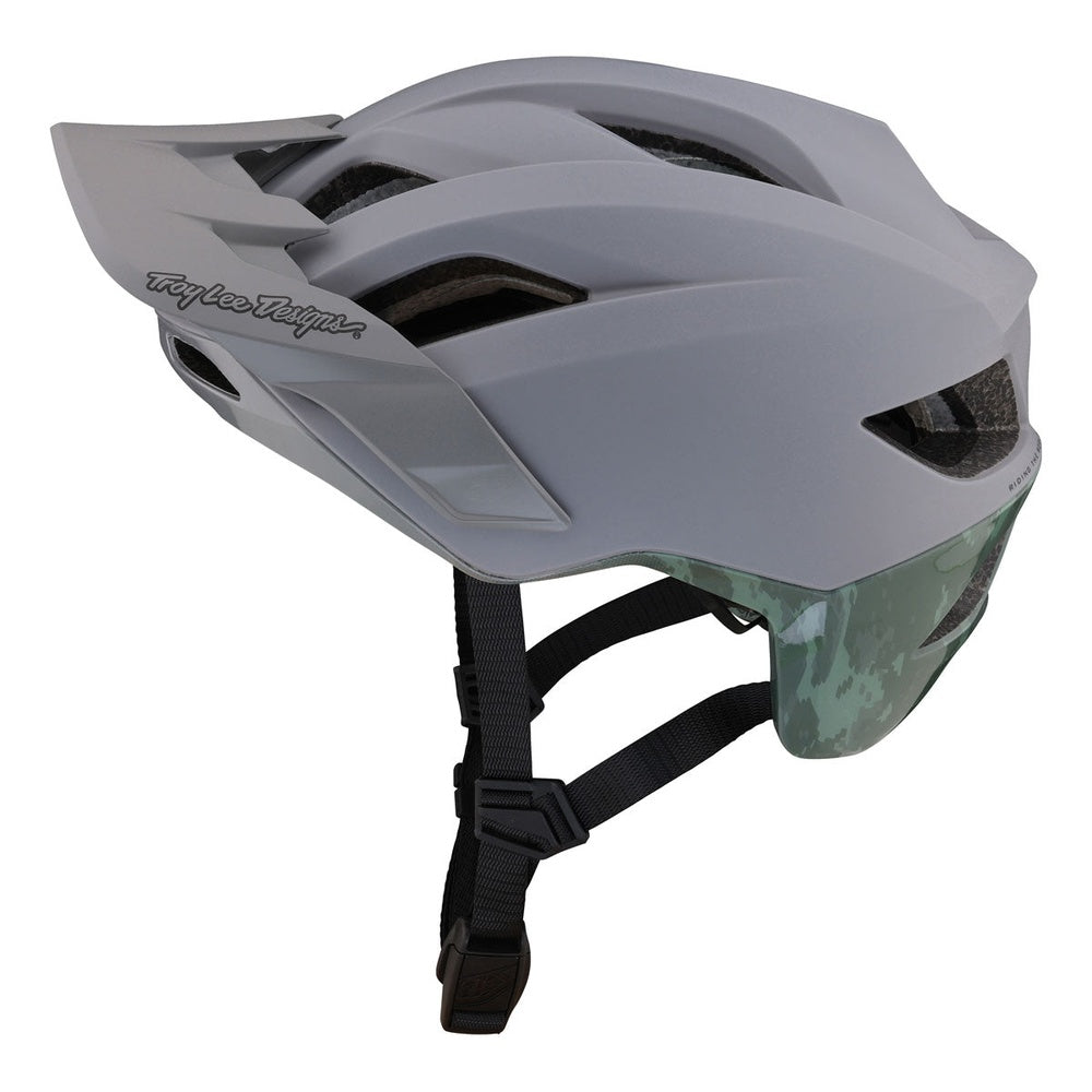 Troy Lee Designs Flowline SE mountain bike helmet in gray with green accents