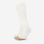 Thorlos white crew tennis sock with tan cushioned toe on sock form