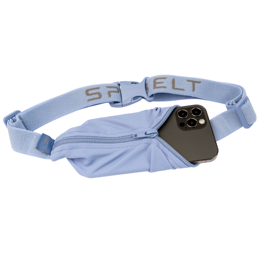 SPIbelt Monochromatic Pro Belt in periwinkle blue with iPhone stored in zippered pocket