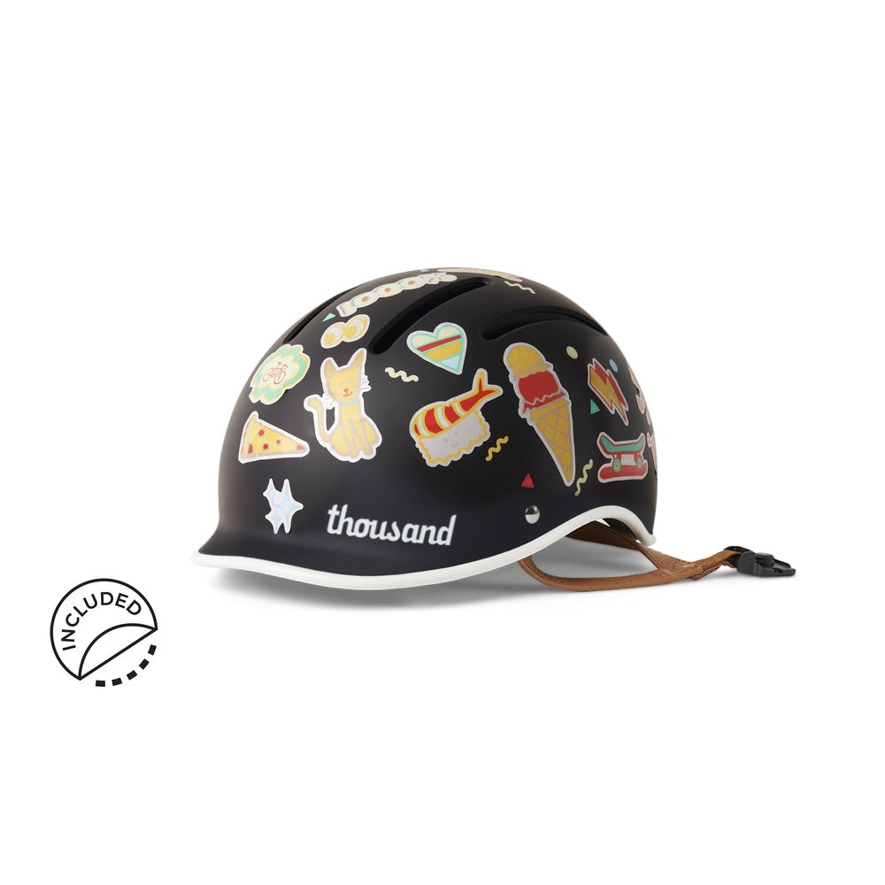 Thousand JR Kids Helmet in Carbon Black with colorful fun sticker graphics on white background