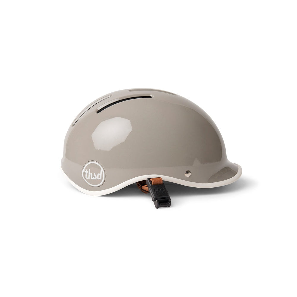 Thousand Heritage 2.0 bike helmet in dove grey with white trim and orange strap