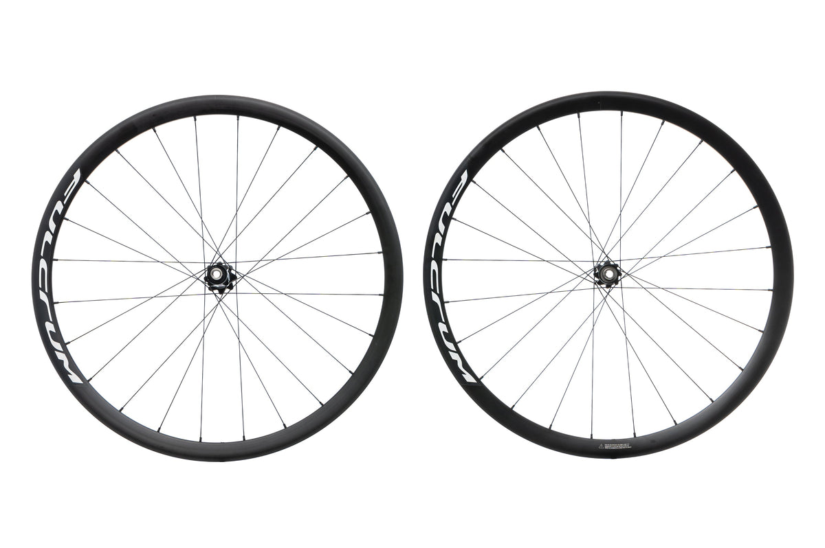 Fulcrum Racing 4 disc brake clincher wheelset pair shown from slightly different angle on white background