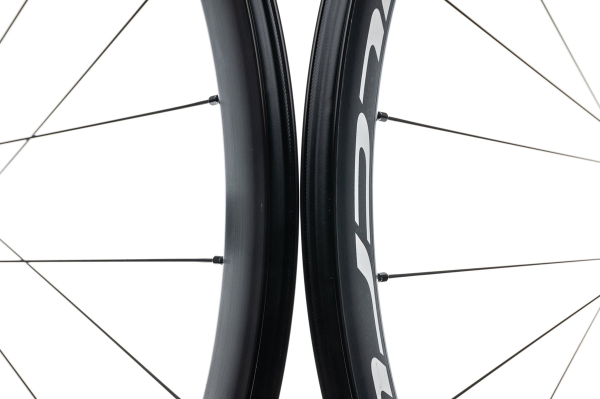 Close-up detail of Fulcrum carbon wheel rims showing rim profile and branding side by side