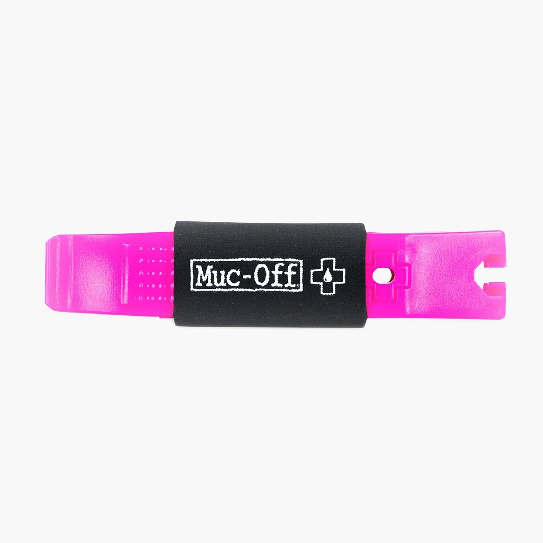 Muc-Off pink tire lever with black grip section and white logo branding