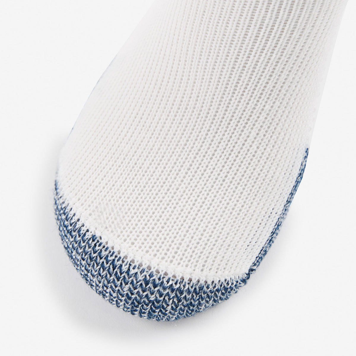 Thorlos running crew sock in white with navy blue cushioned toe close-up detail