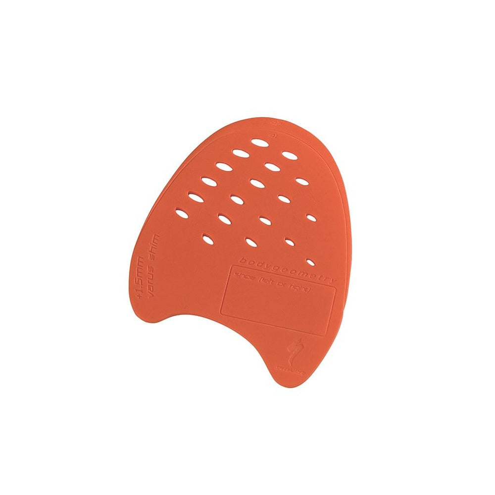 Orange Specialized Body Geometry internal wedge with perforated design and curved shape