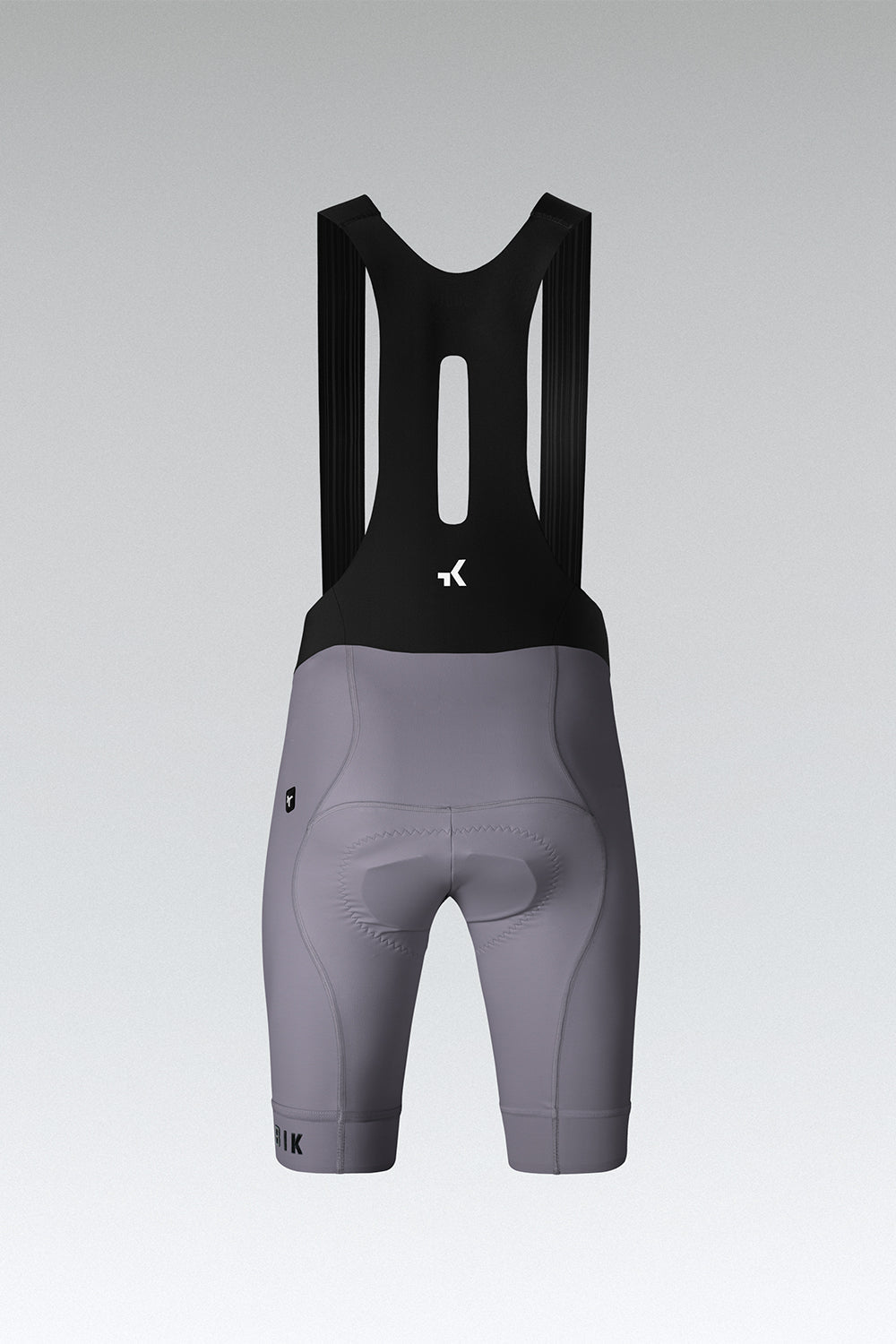 Gobik Absolute Compact 7.0 bib shorts rear view on plain background showing chamois pad in Kettle gray
